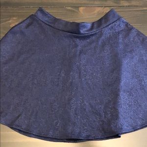 Selena Gomez navy blue patterned skirt